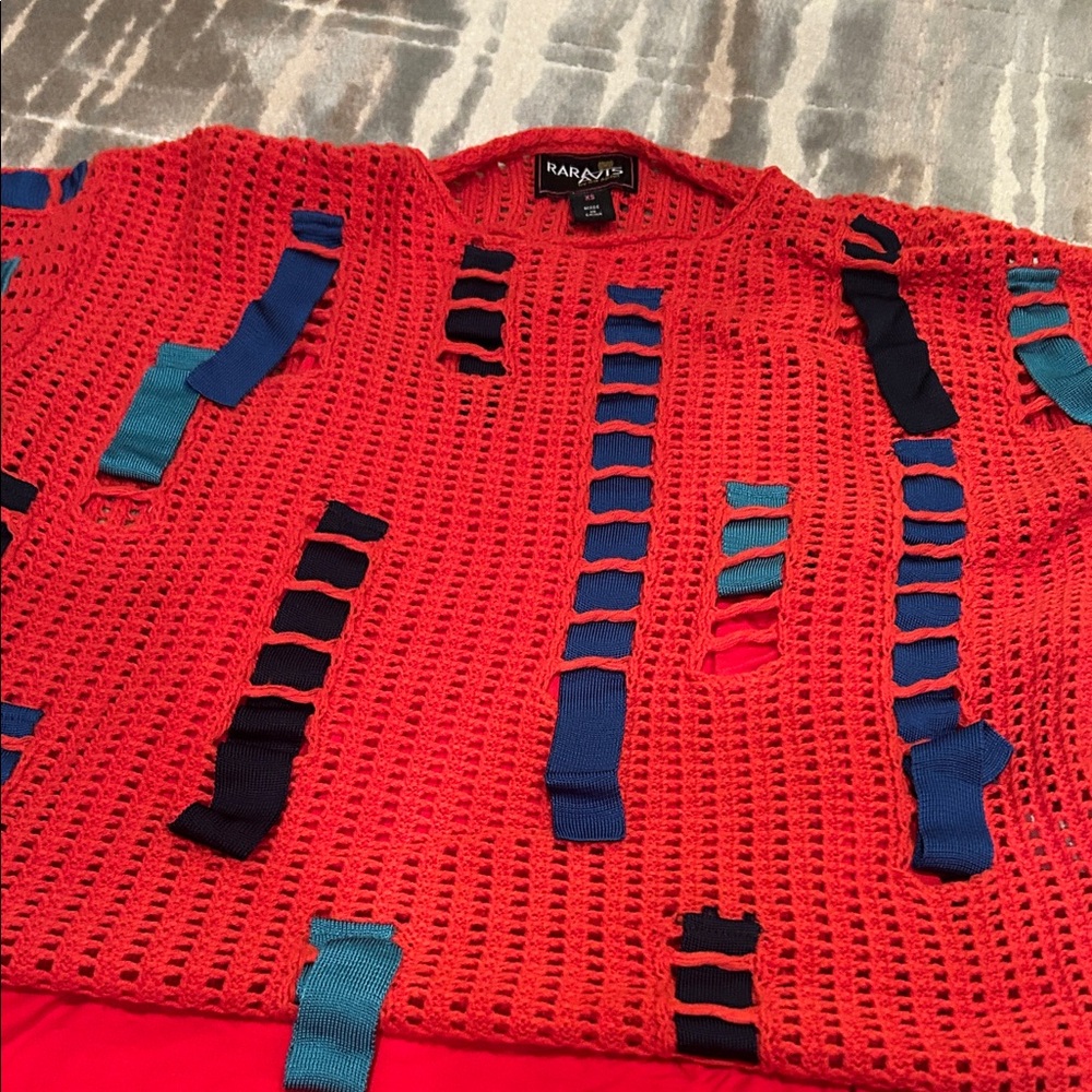Rare Iris Apfel open knit sweater with multicolored ribbons.